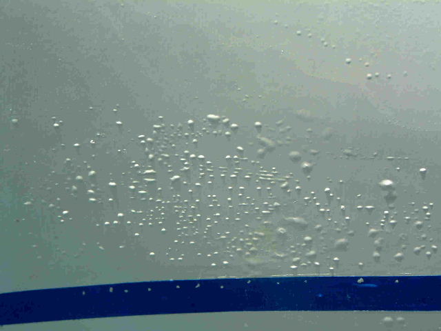 https://seasurveys.co.uk/Images/Survey%20fault%20photos/blistering%20under%20paint.jpg